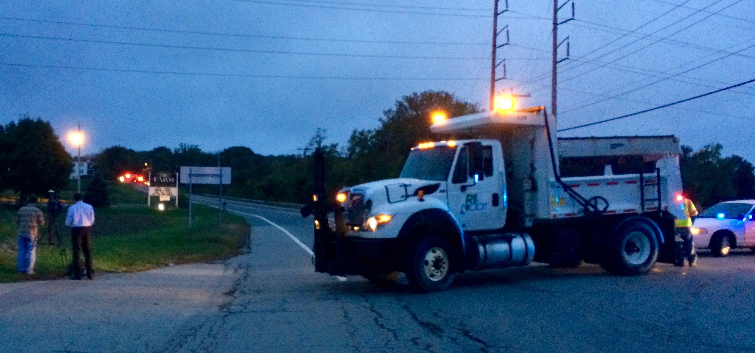 A Rhode Island Department of Transportation truck is used to block off Boyd's Lane at Anthony Road Monday morning.