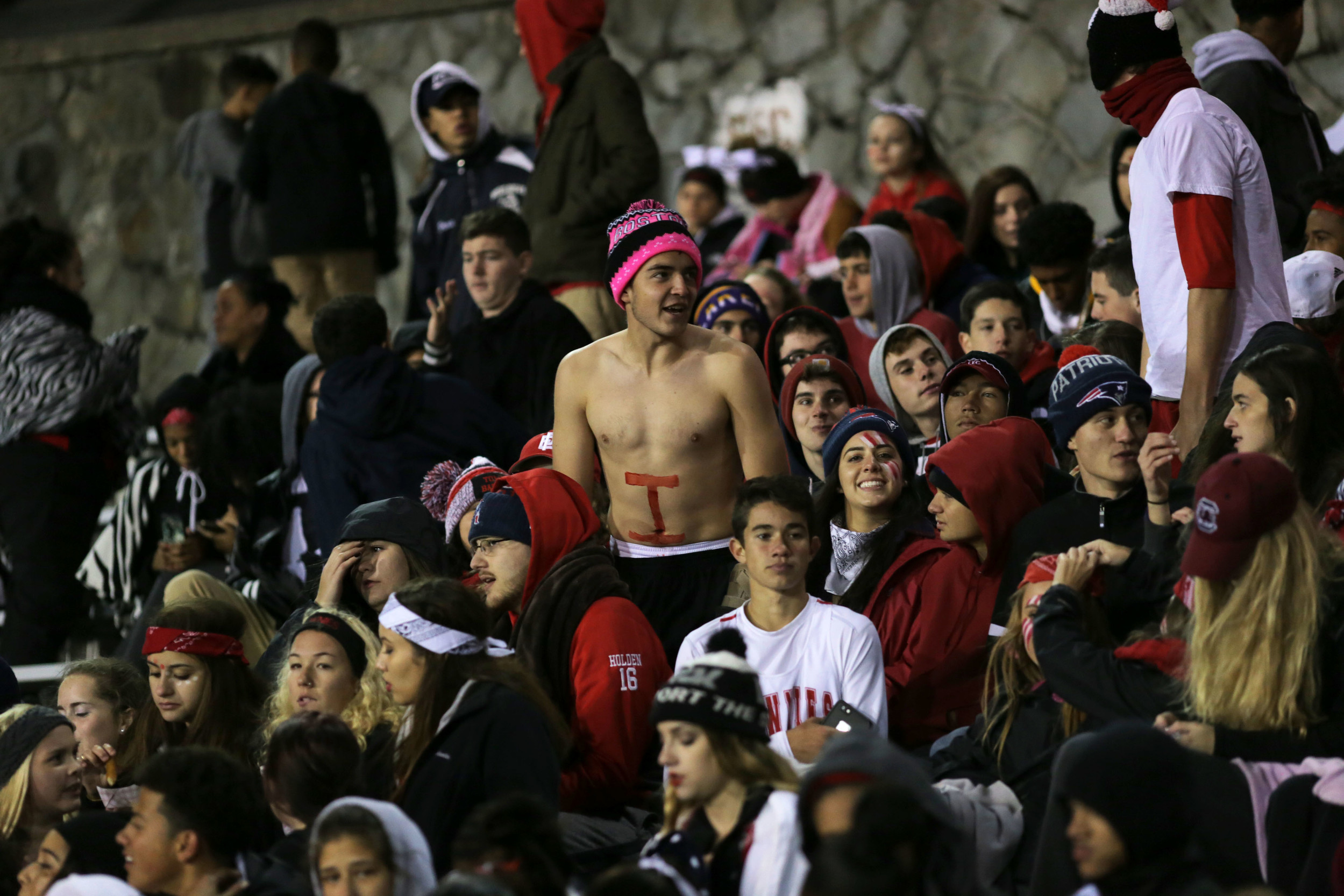 An East Providence fan uses his Townie pride to stay warm.