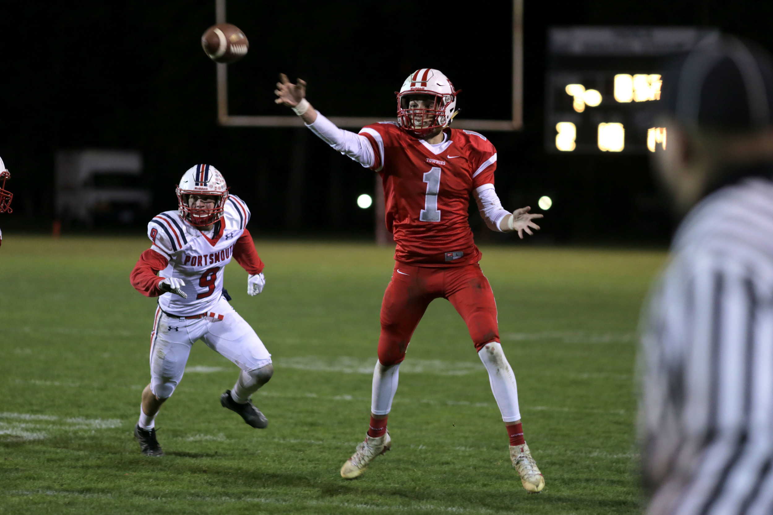 Senior Quarterback Ryan Ellinwood throws to an open receiver after scrambling away from the Portsmouth defense.