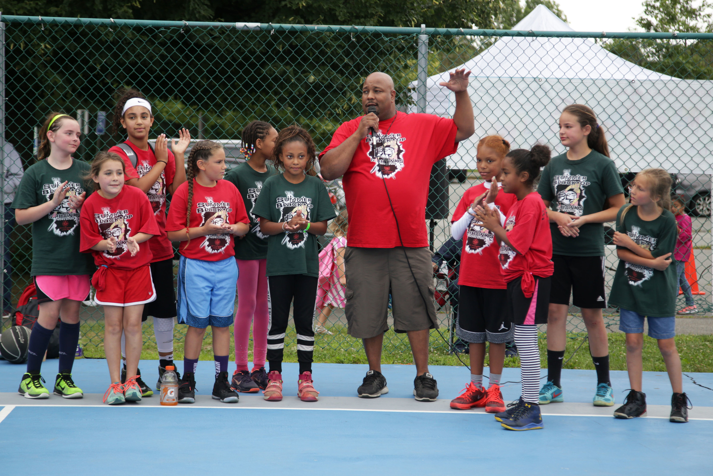 Mohawk President Damion Ramos Awards the playoff trophies to the finalists of the Girls League.
