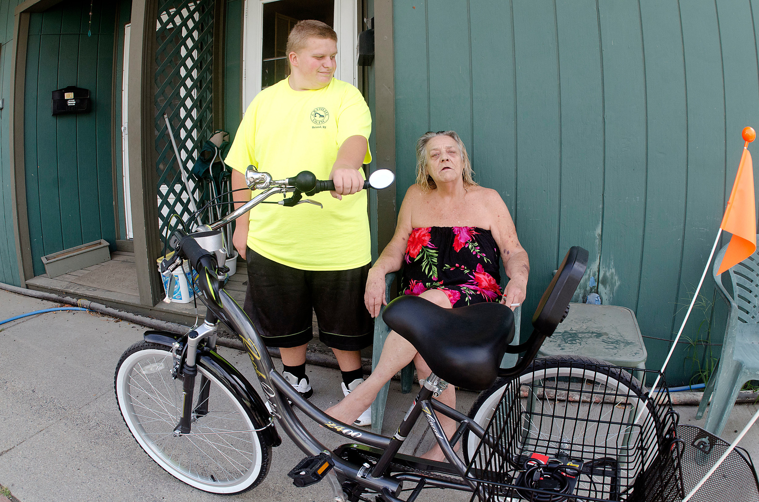 Hunter shows the new bike to his grandmother Kitty.