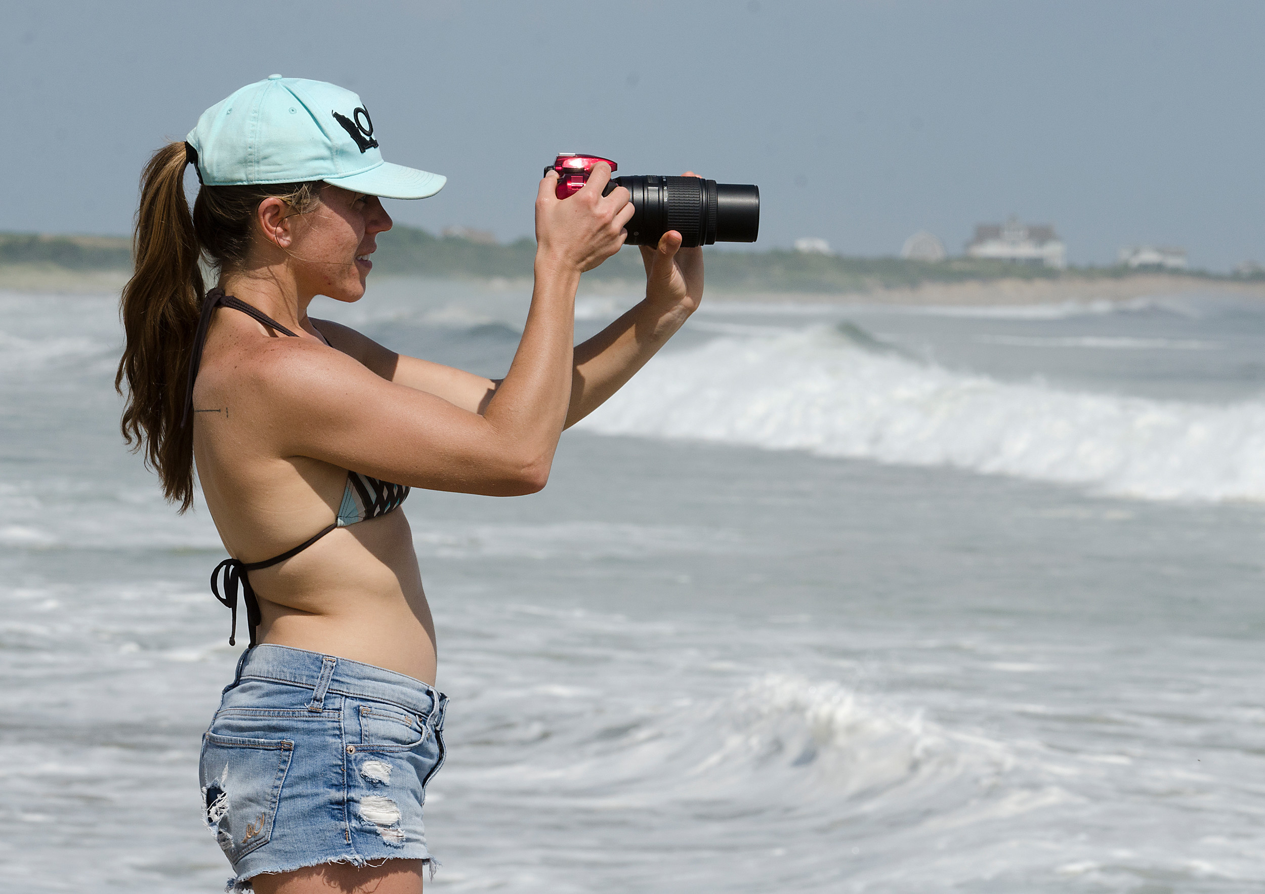 Sarah Hope holds her camera steady while taking video of her spouse, Monica Riehl.