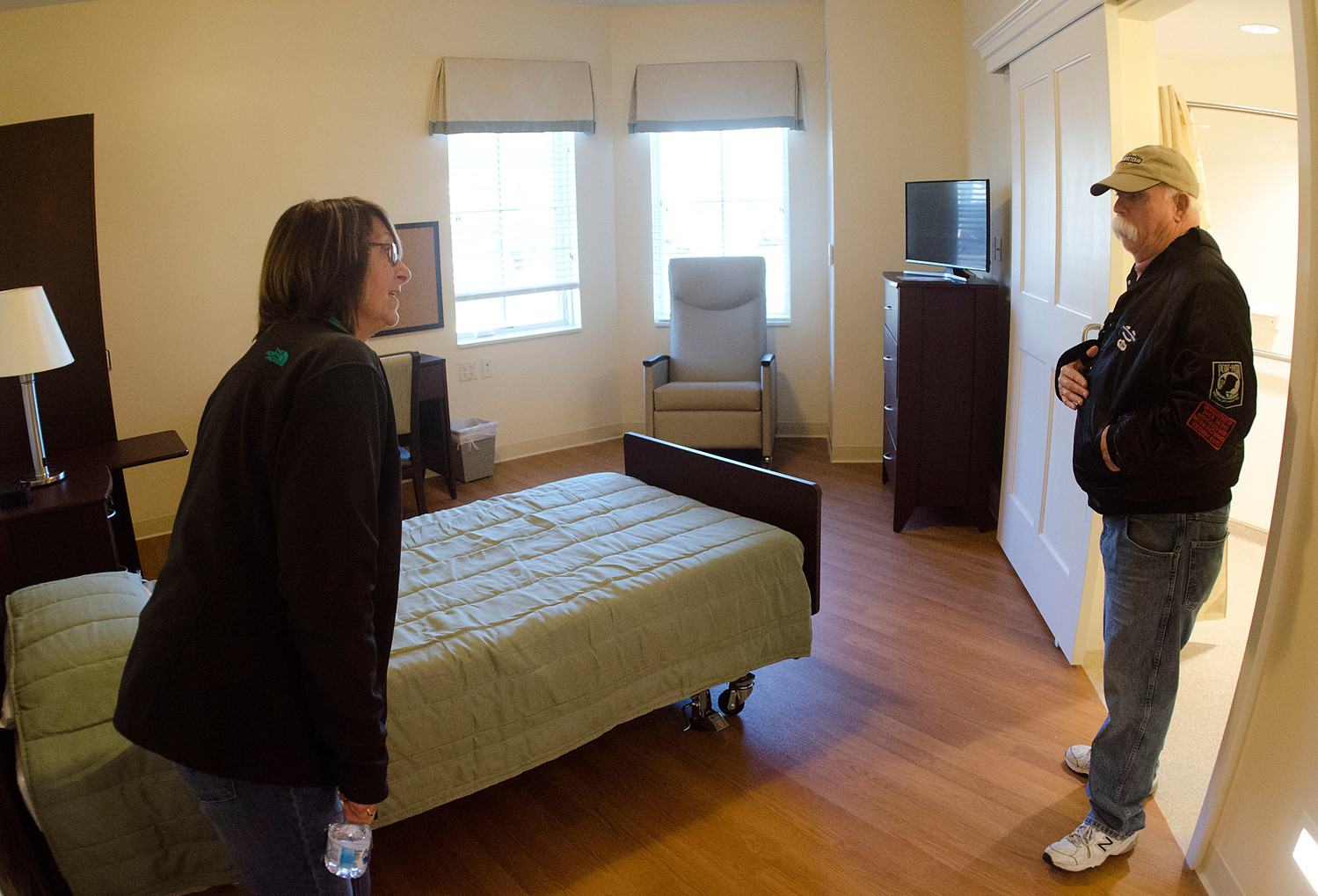 Hellen McCollum and Vietnam veteran Bill McCollum check out a bedroom at the new facility.