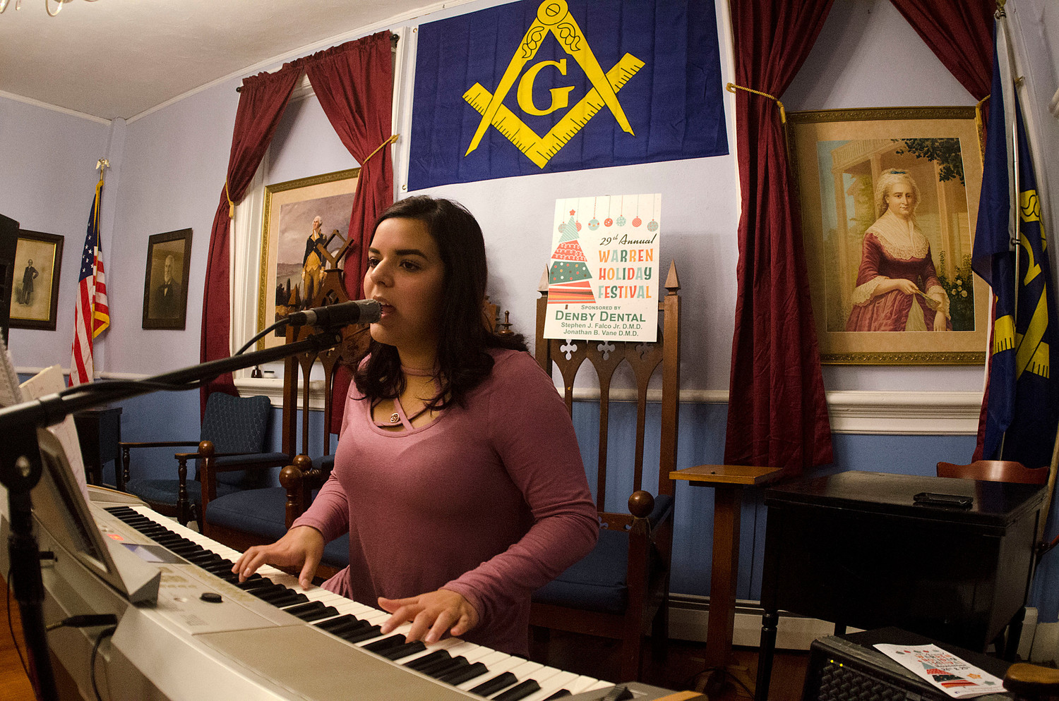 Bianca Cabral sings an original song called "Lost" for a small gathering in the Masonic Temple.