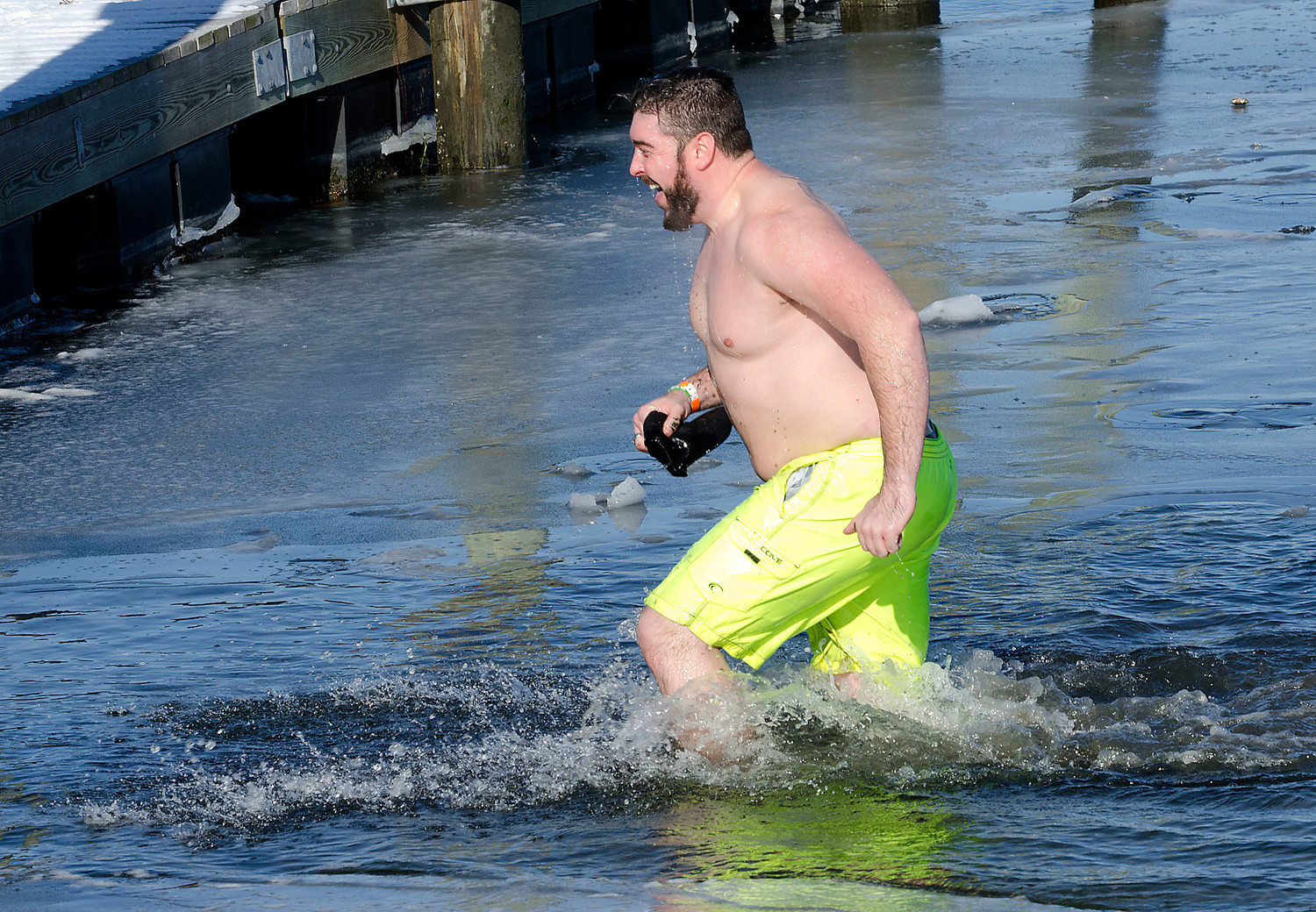 After his plunge, he quickly ran back to the dock to get a towel.