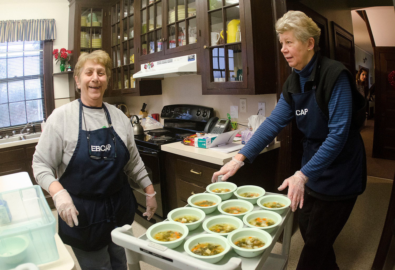 Bristol Senior Center kitchen manager Ann Primiano (left) and volunteer Sarah Hertfelder prepare soup for the seniors on Tuesday.