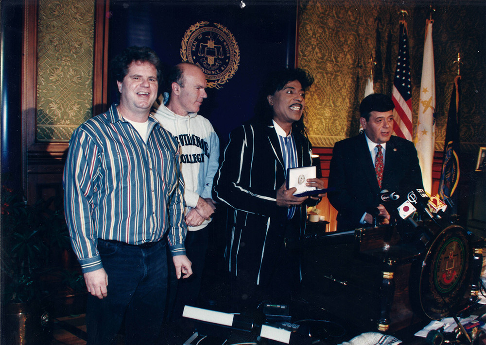 Jack Reich (Lupo's booking agent), Rich Lupo (owner) watch as rock and roll legend Little Richard receives the key to the city from then-mayor Buddy Cianci