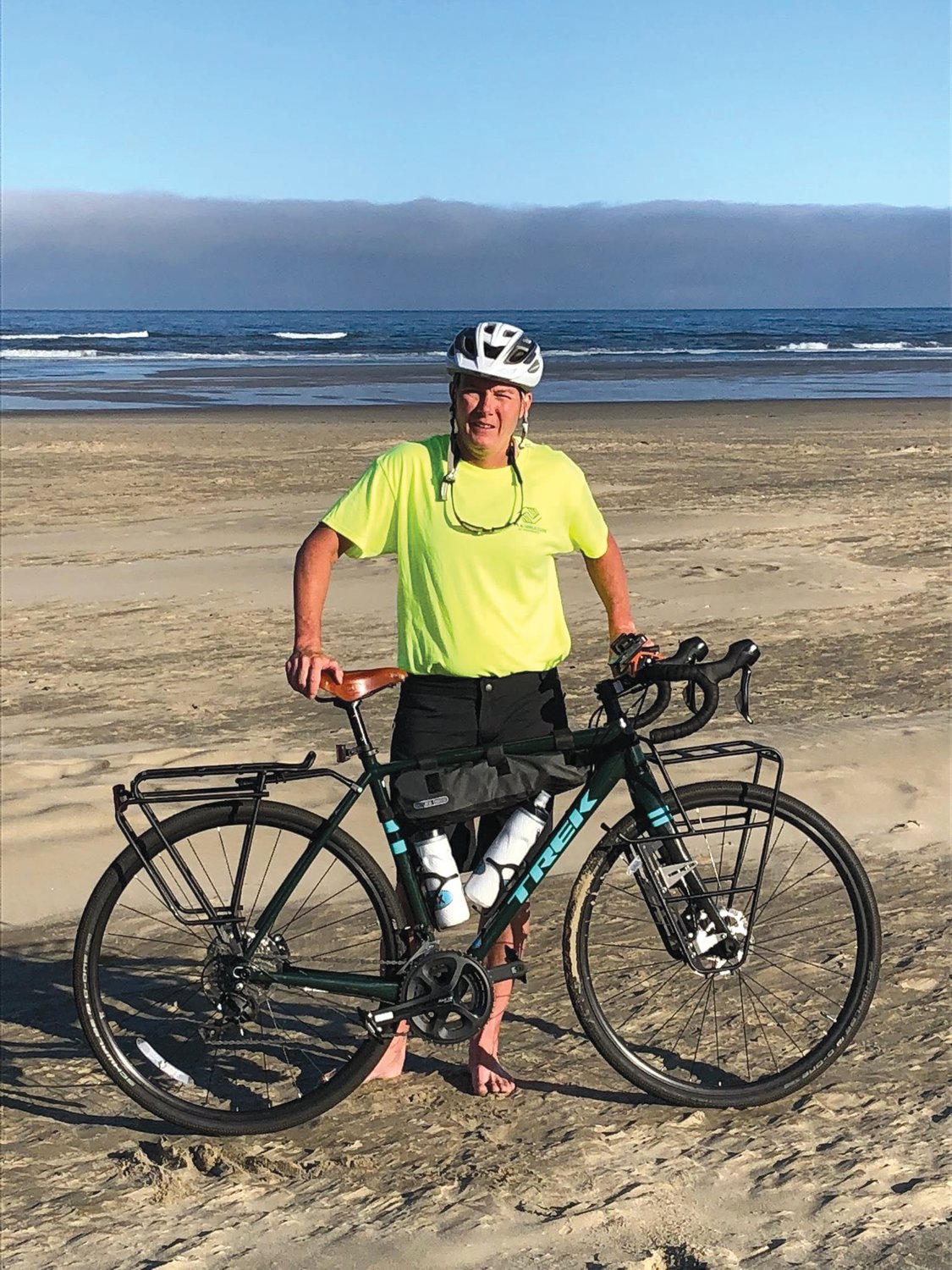READY TO START: With the Pacific Ocean as a backdrop, Judy Davis and the bike she pedaled from Oregon to Rhode Island.